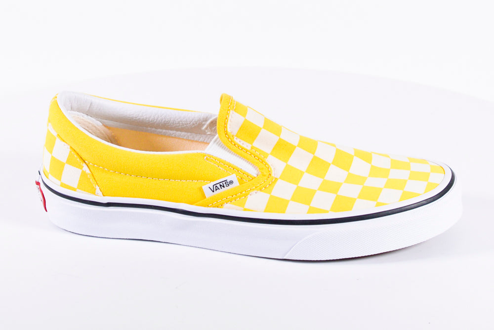 Pastel yellow vans sales slip on