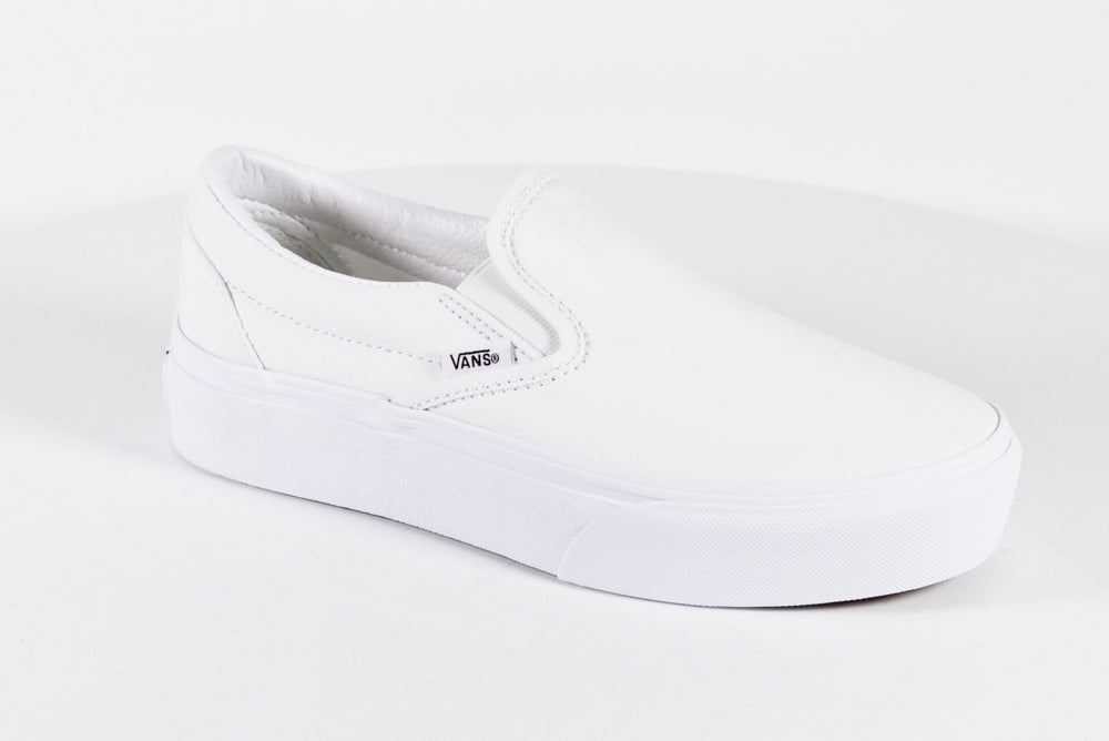 platform slip on vans white